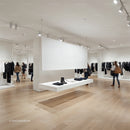 Minimalist Clothing Store Interior with Neutral Tones