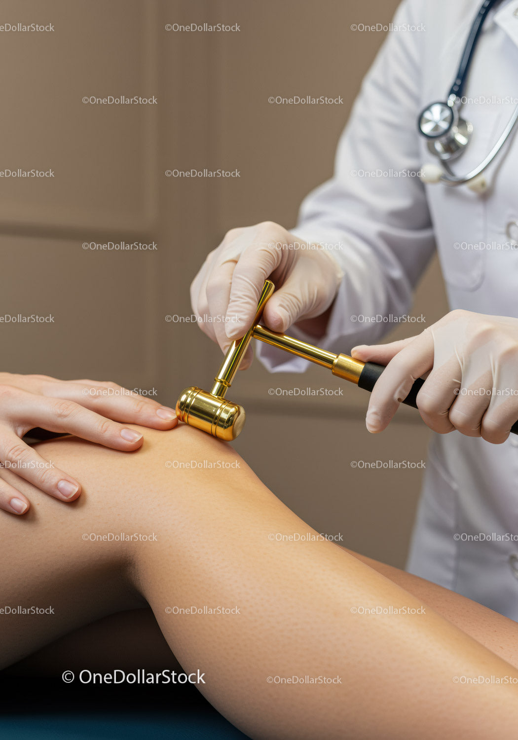 Doctor Performing Acupuncture on Patient Leg with Gold Acupuncture Needle