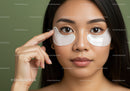 Young Woman with Eye Patches Skin Care Facial Treatment
