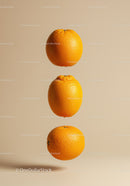 Three Fresh Oranges Suspended on Soft Beige Background