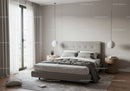 Modern Bedroom with Gray Headboard and Pendant Lighting