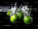 Limes Splashing Water in a Dynamic and Refreshing Scene