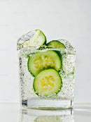 Refreshing sparkling water with fresh cucumber slices