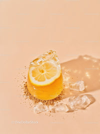 Refreshing lemon slice frozen inside melting ice cube