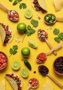 Fresh ingredients and tacos on bright yellow background