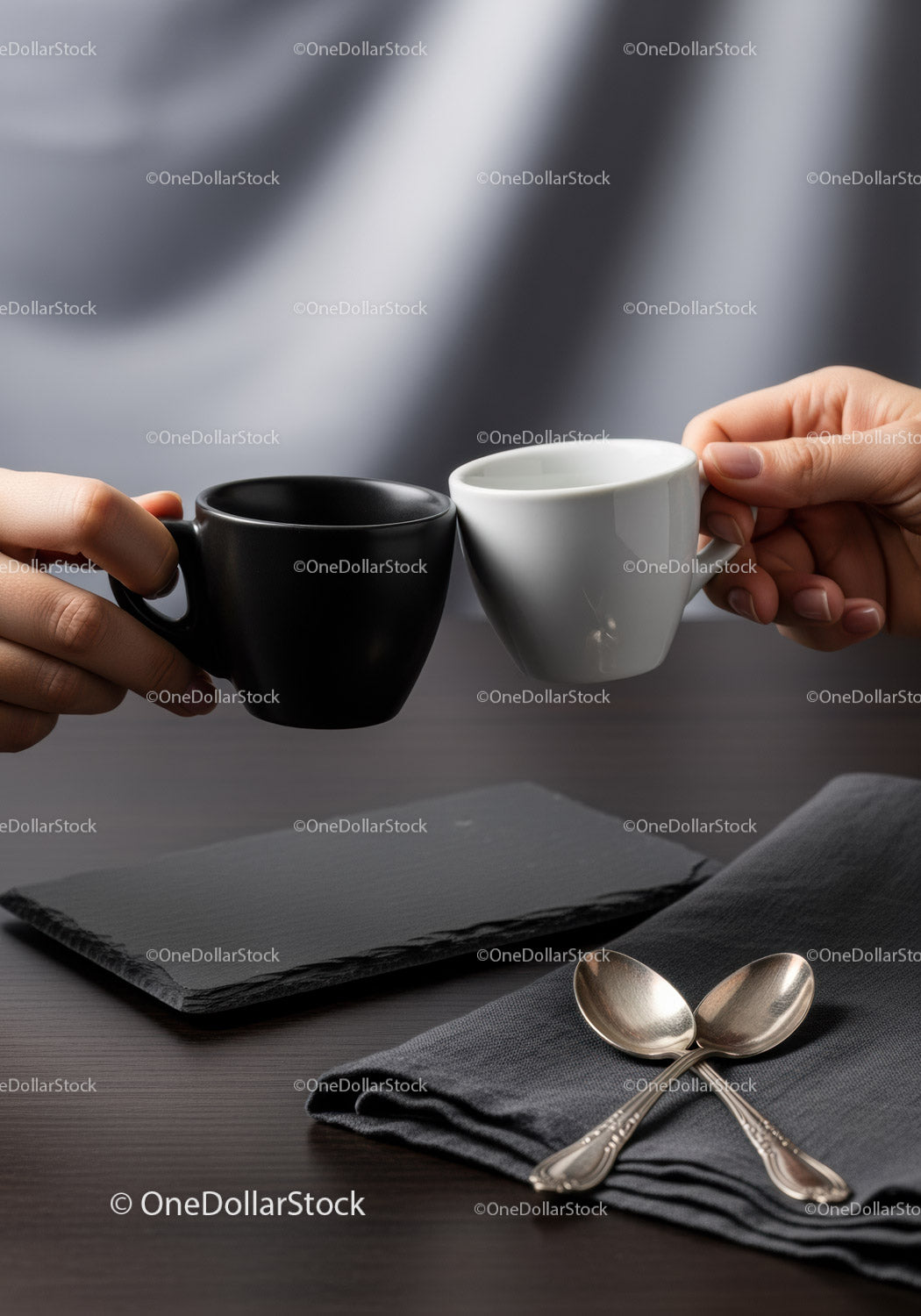 Two Ceramic Coffee Cups on Dark Wooden Table with Silver Spoons
