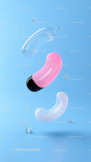 Colorful Gel Capsules Floating in Air With Water Droplets