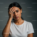 Confident Woman with Intense Gaze in Studio Portrait Photography