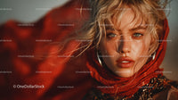 Glamorous Blonde Woman with Blue Eyes Wearing Red Scarf in Studio