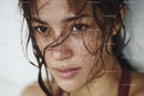 Close-up of a Young Woman with Wet Hair and Natural Beauty