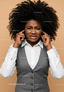 Frustrated Woman Covering Ears with Annoyed Expression