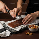 Chocolate Bar Being Grated with Handheld Zester for Dessert Decoration