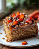 Strawberry Cake Slice with Nut Topping and Chocolate Glaze