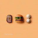 Gourmet Burger with Lettuce and Tomato Next to Grilled Steak and Dumpling