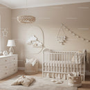 Serene Baby Nursery with Cloud Wall Art and Cozy Decor