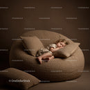 Toddler Sleeping Peacefully on Cozy Brown Bean Bag Chair