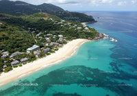 Beautiful Tropical Beach with Lush Green Mountains and Azure Waters