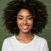 Portrait of a Smiling Woman with Curly Hair Against Green Background