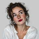 Freckled Woman with Red Lipstick and Wavy Hair in Portrait