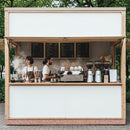 Baristas Preparing Coffee at Minimalist Outdoor Kiosk