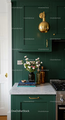 Stylish Green Kitchen with Gold Accents and Floral Decor