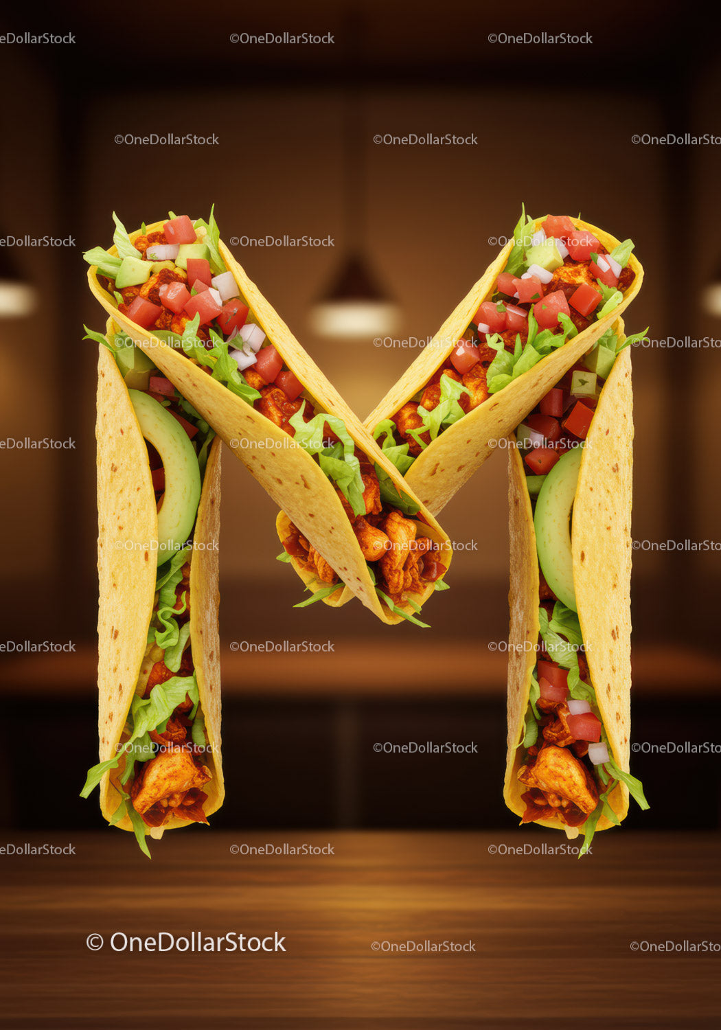 Tacos ułożone w kształcie litery M na drewnianym stole