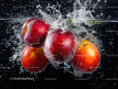Fresh Red Apples with Water Splash in Vibrant Underwater Scene