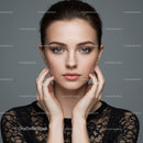 Elegant Female Portrait with Blue Eyes and Clear Skin in Studio