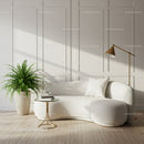 Modern Curved Sofa with Green Plant in Bright Living Room