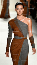 Confident Model Walking Runway in Stylish Two Tone Dress