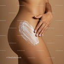 Close-up of Woman Applying Sunscreen on Thigh with Skin Care Focus