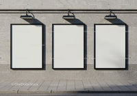 Three Blank Billboards Mounted on Concrete Wall