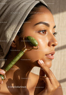 Woman Receiving Jade Roller Facial Massage for Skin Rejuvenation