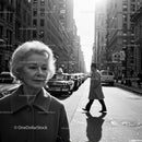 Elderly Woman Walking Alone in Busy City Street Black and White