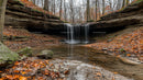 Tranquil Autumn Waterfall in a Serene Forest Setting