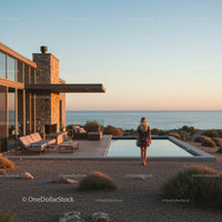 Woman Standing by Infinity Pool at Sunset with Ocean View