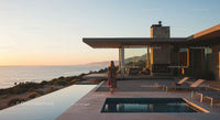 Modern Coastal Home with Infinity Pool at Sunset