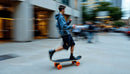 Young Man Skateboarding in Dynamic Urban Setting