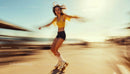 Young Woman Roller Skating on a Sunny Beachside Path