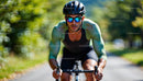 Focused Cyclist Riding Through Lush Green Scenery