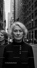 Senior Woman on a Busy City Street in Black and White