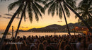 Tropical Beach Party at Sunset with Palm Trees and Crowds