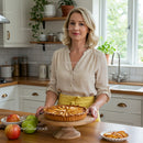 Woman in Cozy Kitchen with Freshly Baked Apple Tart