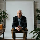 Elderly Man in Business Attire in Modern Studio Setting