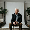 Senior Gentleman in Formal Attire Seated in Indoor Studio