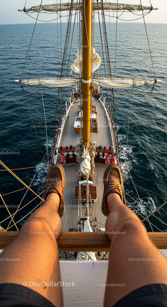 Legs Relaxing on a Sailboat Adventure Over the Ocean
