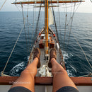 Relaxing on a Yacht Sailing the Open Sea