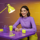 Smiling Woman in Purple Sweater at Colorful Workspace