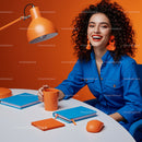Cheerful Woman in Vibrant Orange and Blue Office
