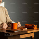 Cozy Morning with Coffee and Writing Tools on Wooden Desk